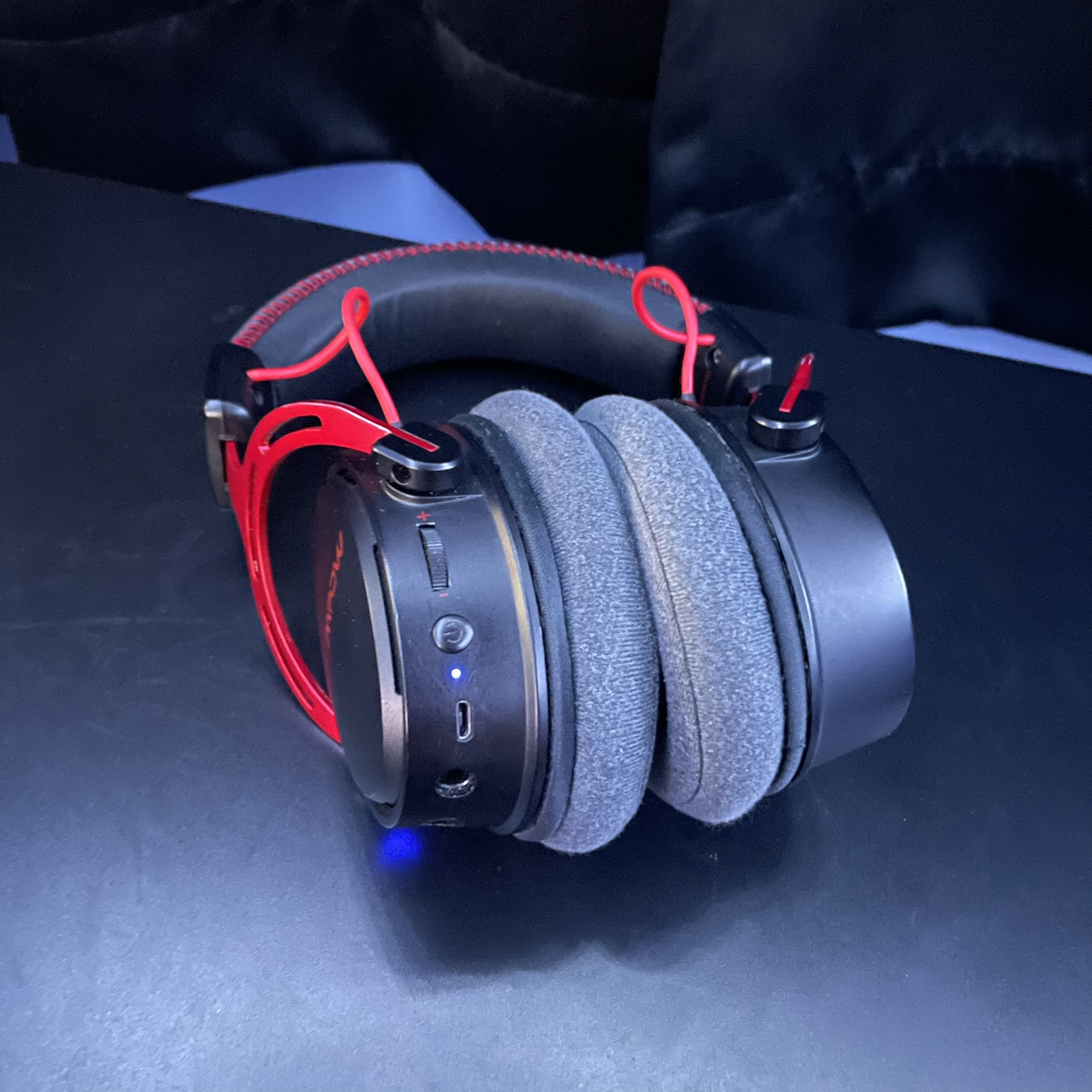 This is a gaming headset with the sound of the over ear parts being adjusted