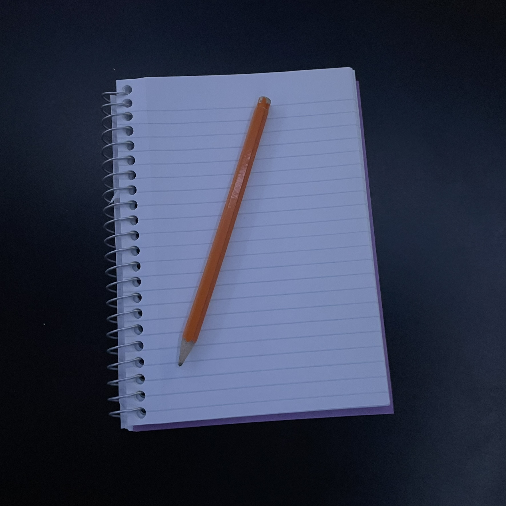 This is a pencil and paper along with the sound of it being used and drawn on