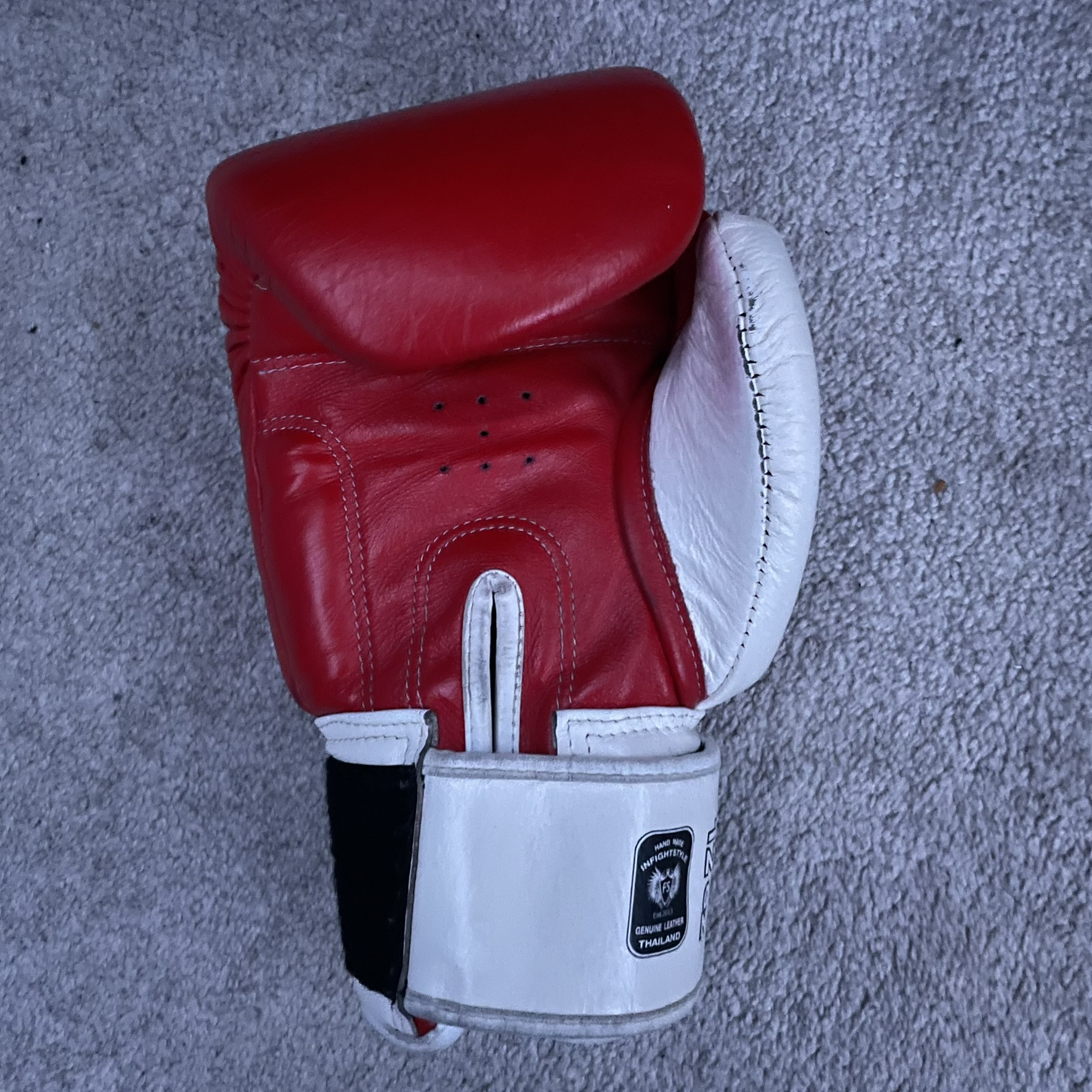 This is a boxing glove but the focus is the sound of the velcrow used to adjust the wrist size